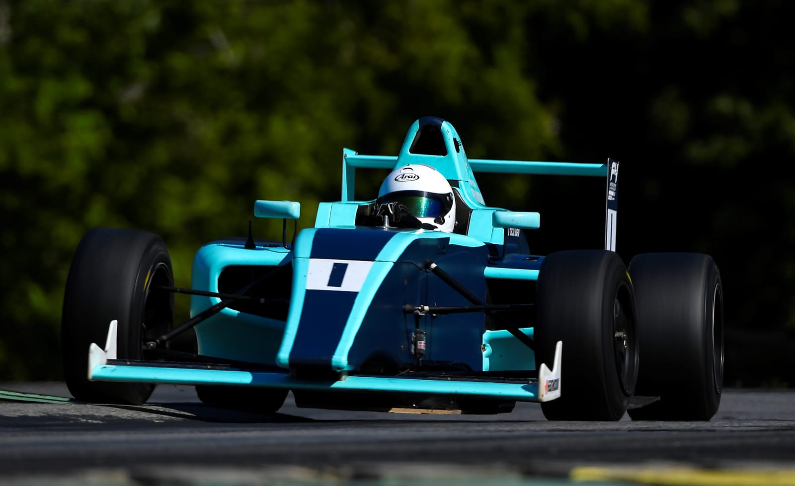 The FastLane Ligier JS F4 open-wheel formula car at Buttonwillow Raceway Park.