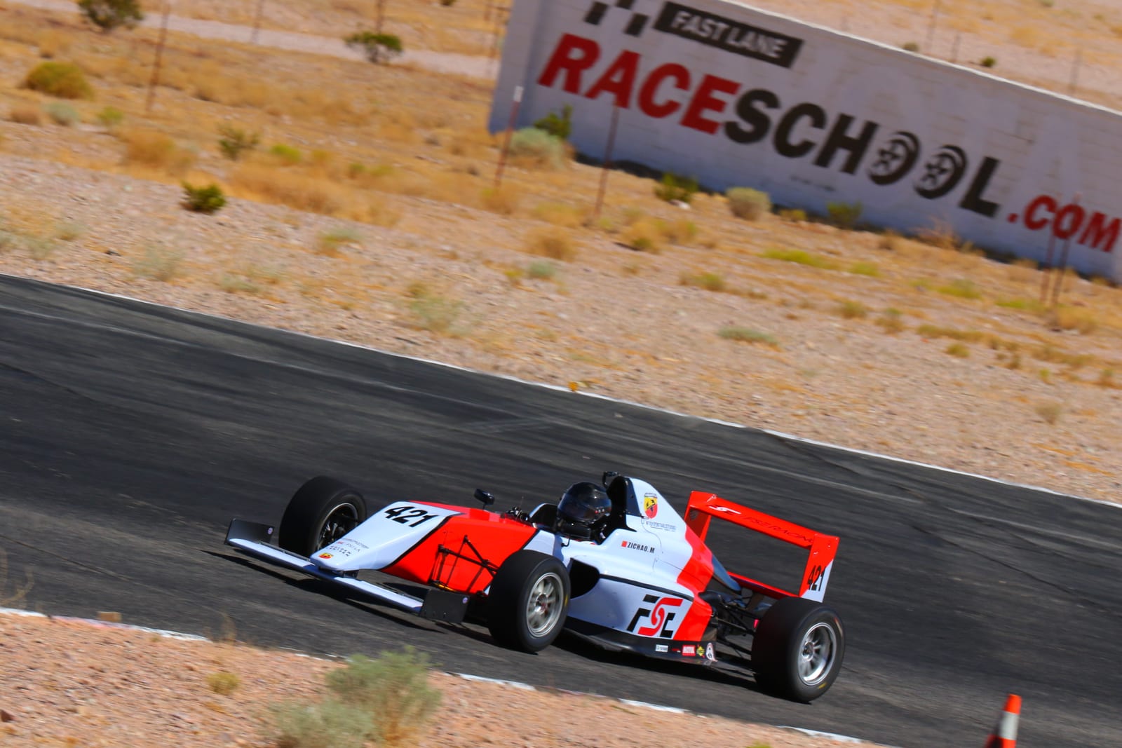 The FastLane Ligier JS F4 open-wheel formula car at Buttonwillow Raceway Park.