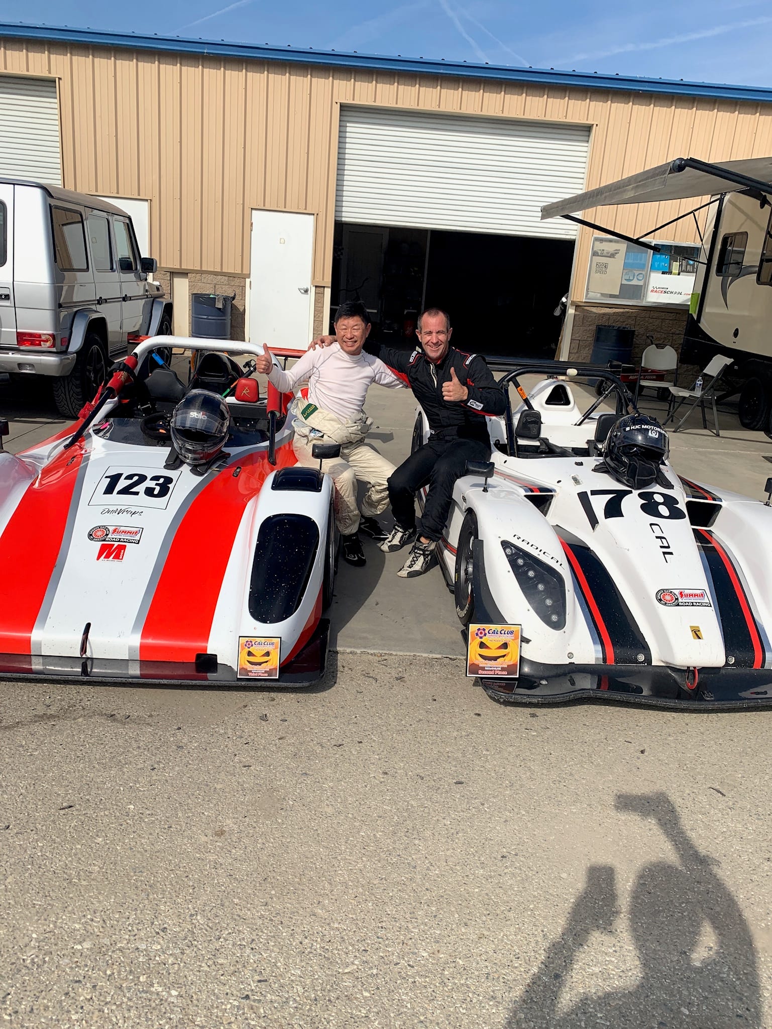 Drivers celebrating a podium finish at Buttonwillow Raceway Park.